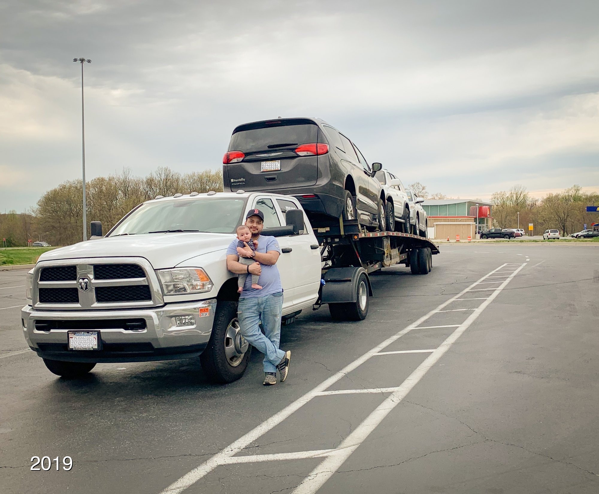 David Paulo and son Nicholas in front of one of PAT's first trucks